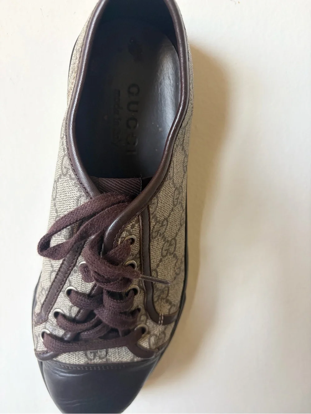Gucci Men’s GG Canvas Low-Top Sneakers in Brown and Black